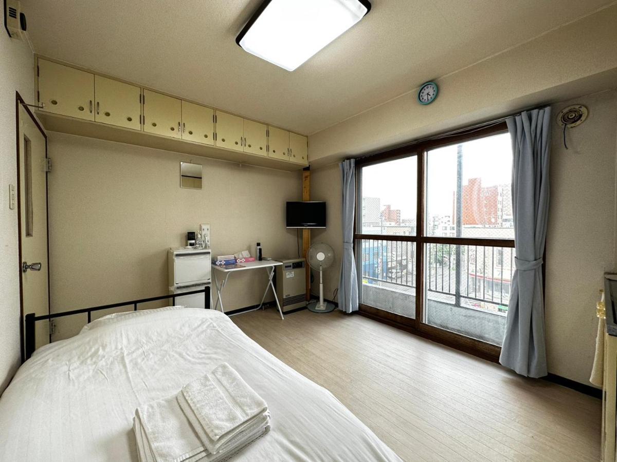 Hokusei Bldg 42 ほくせいビル 42号室 Apartment Sapporo Bagian luar foto